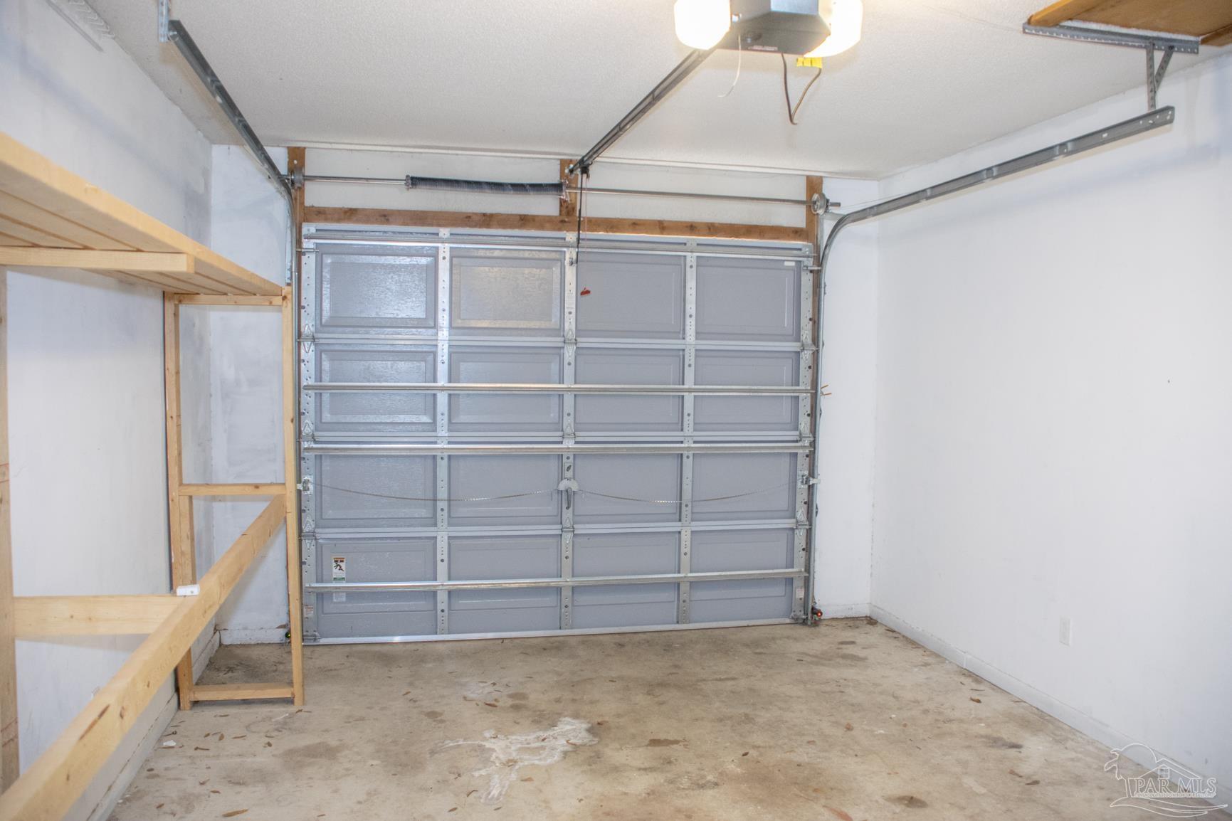 6514 Oakcrest Road Milton, FL 32570 - Photo 63 of 68 a view of walk in closet with empty racks