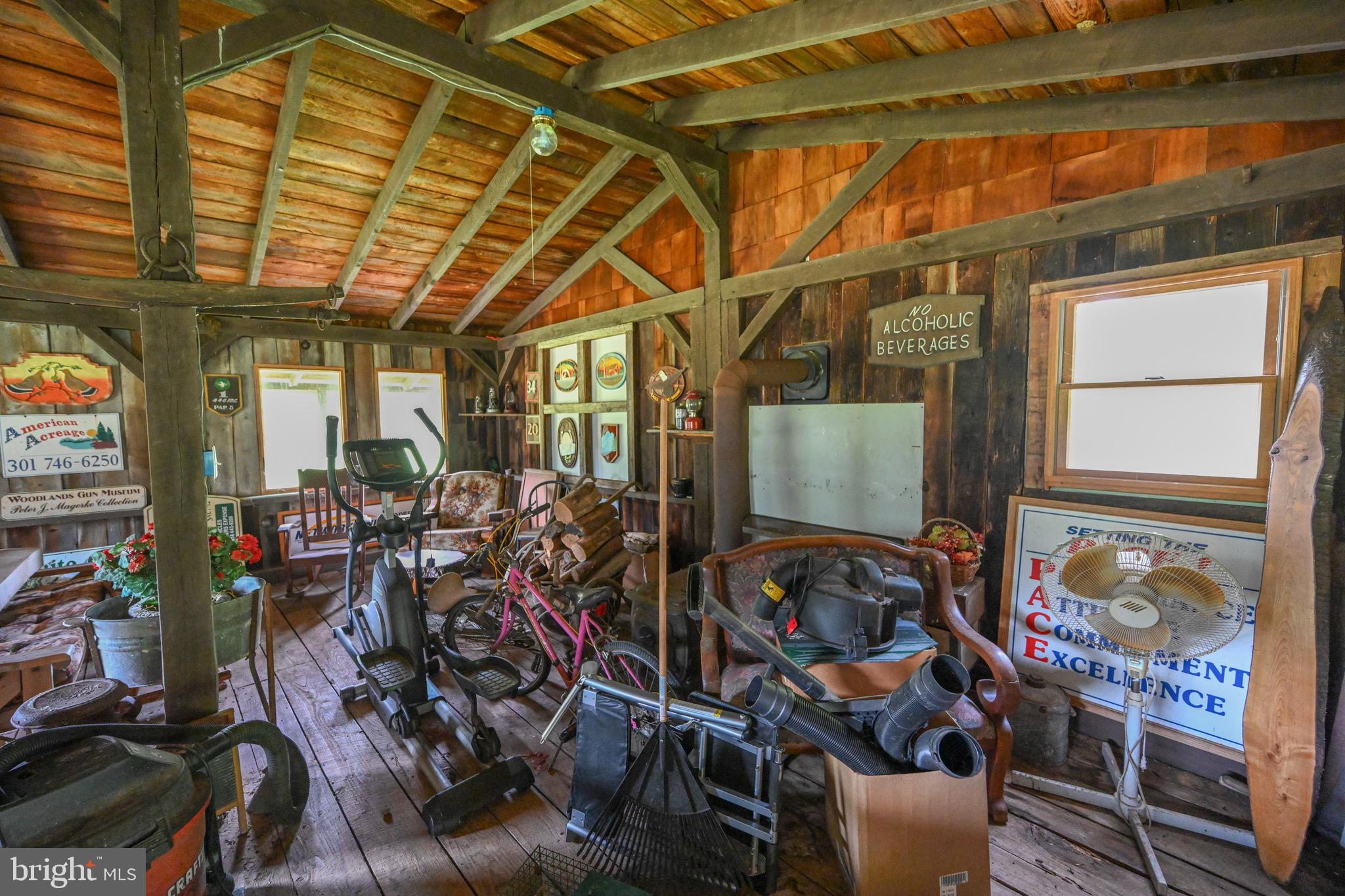 2527 Pigs Ear Road Grantsville, MD 21536 - Photo 68 of 94 a view of a storage room with racks on the wall