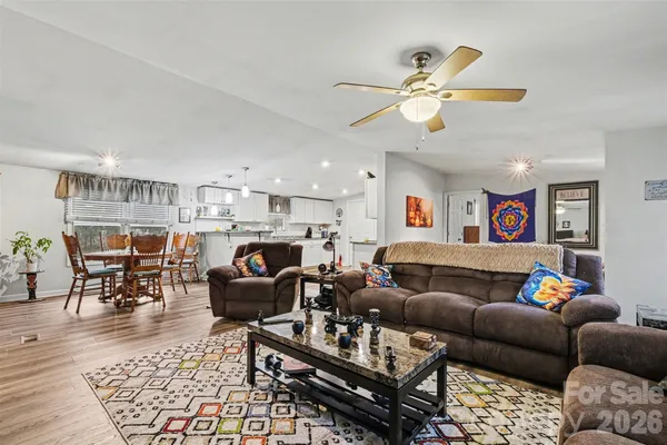 a living room with furniture and a rug