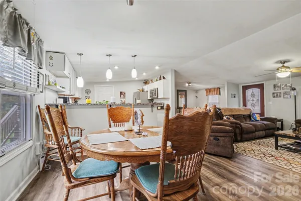 a view of a dining room with furniture