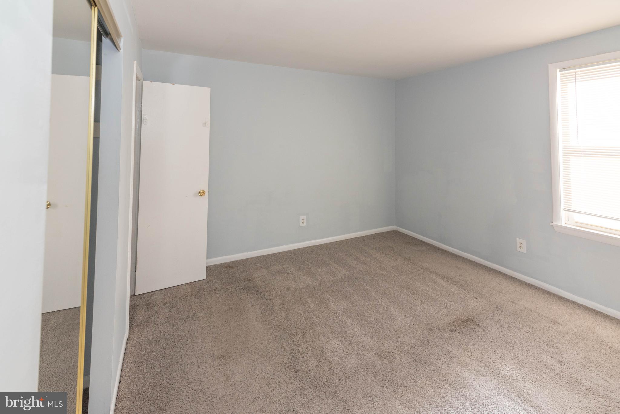 3712 Mayberry Avenue, Unit E Baltimore, MD 21206 - Photo 11 of 22 an empty room with a window