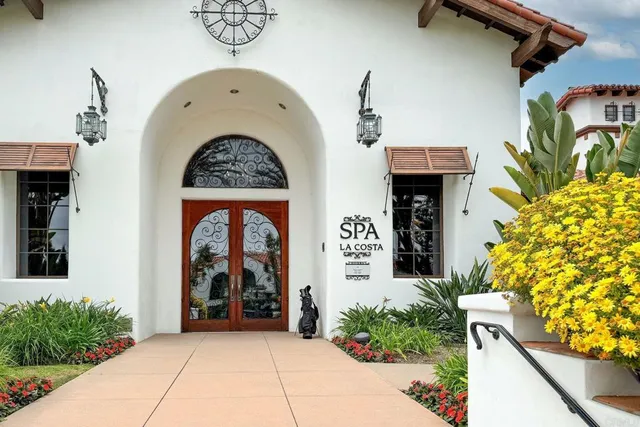 a view of entryway with flower pots