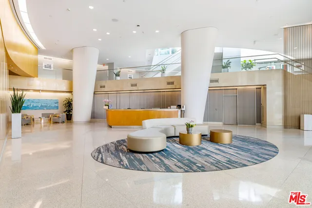 a kitchen with a table and chairs