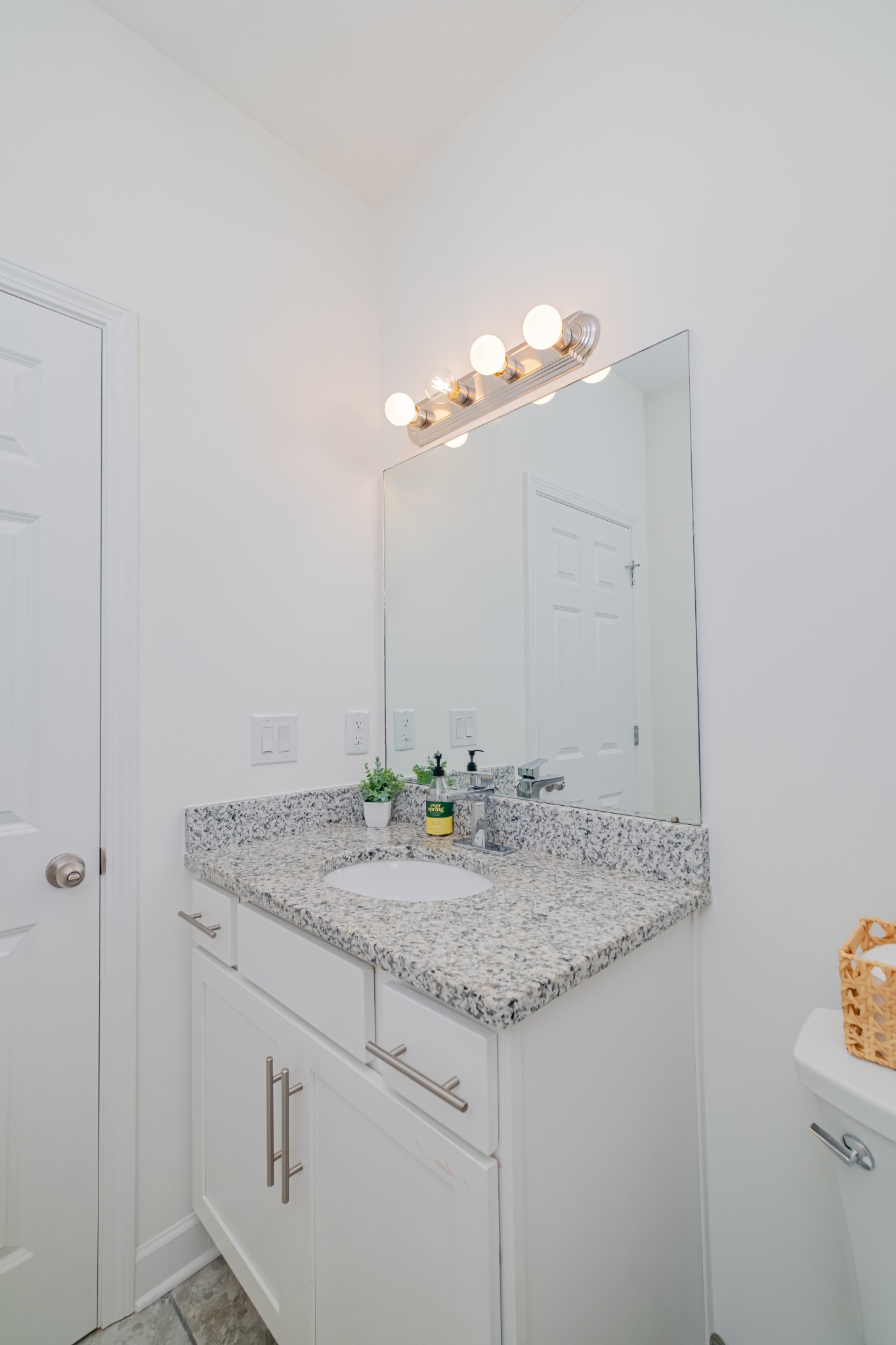 4781 Brookhollow Road Chapel Hill, TN 37034 - Photo 38 of 57 a bathroom with a granite countertop sink and a mirror