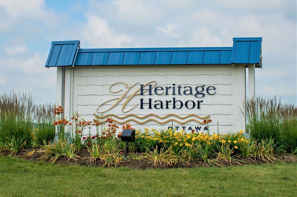326 Leeward Way Ottawa, IL 61350 - Photo 7 of 7 a sign on the side of a building