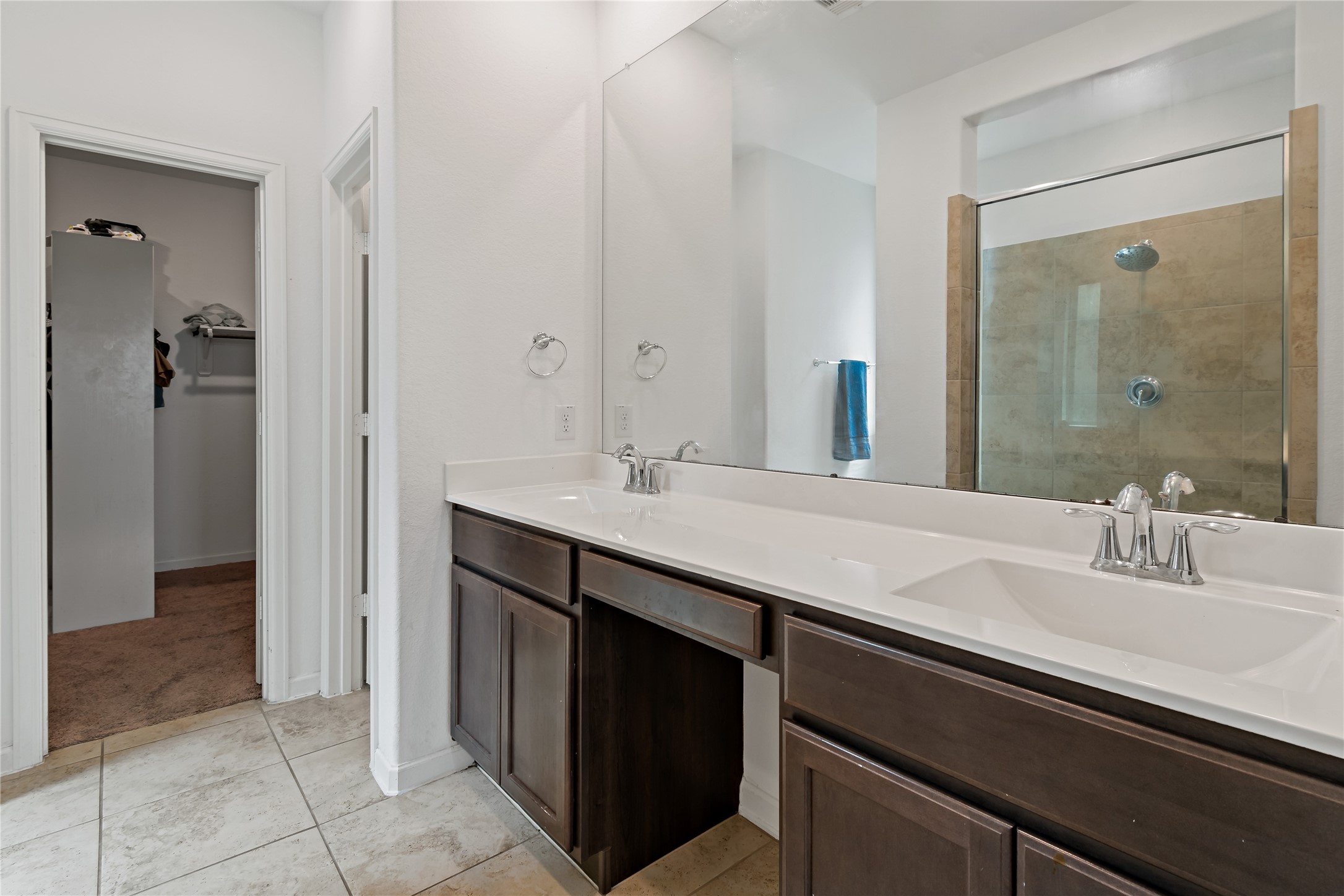 14010 Hartford Heights Way Rosharon, TX 77583 - Photo 12 of 30 a bathroom with a sink double vanity and a mirror