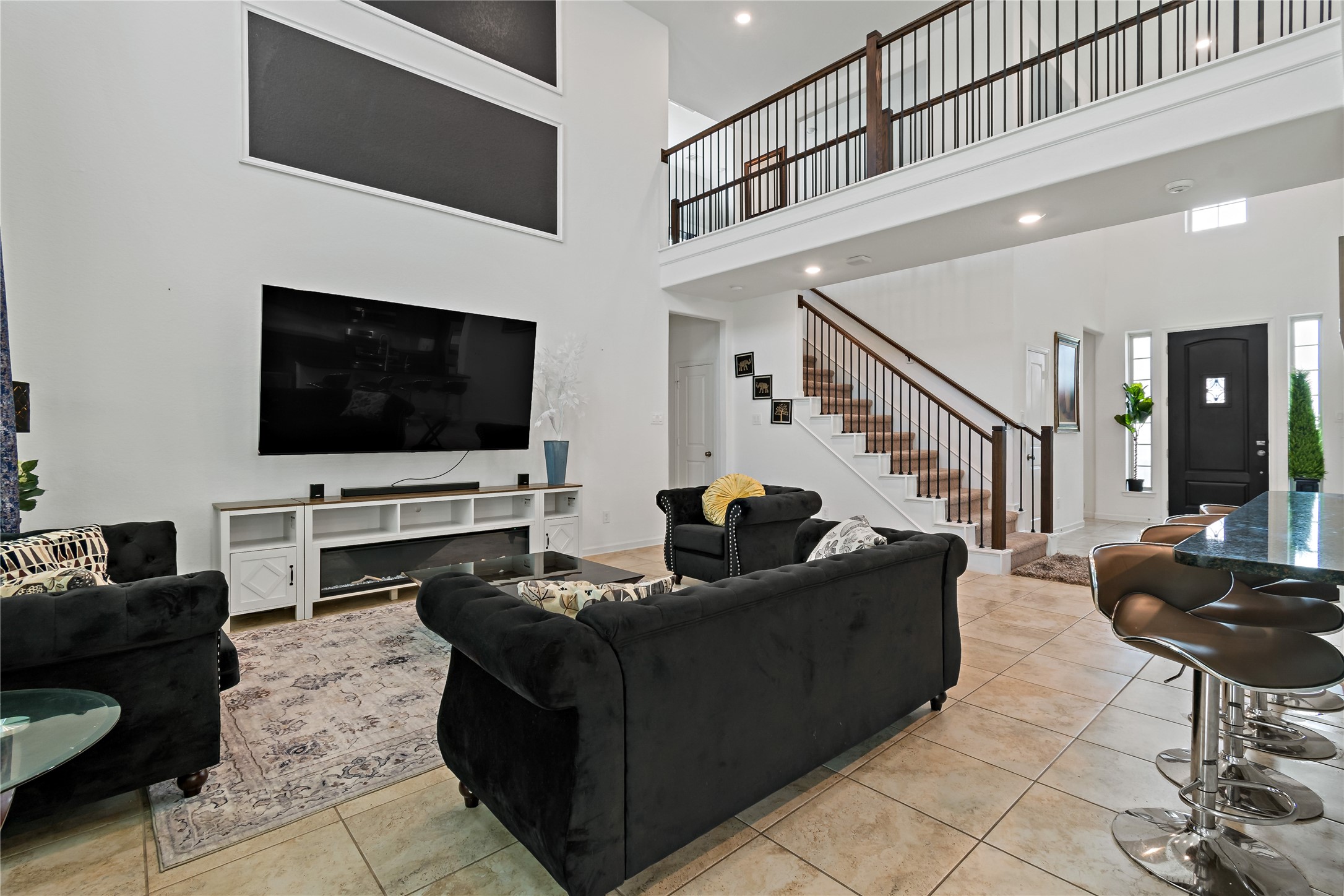14010 Hartford Heights Way Rosharon, TX 77583 - Photo 2 of 30 a living room with furniture and a flat screen tv