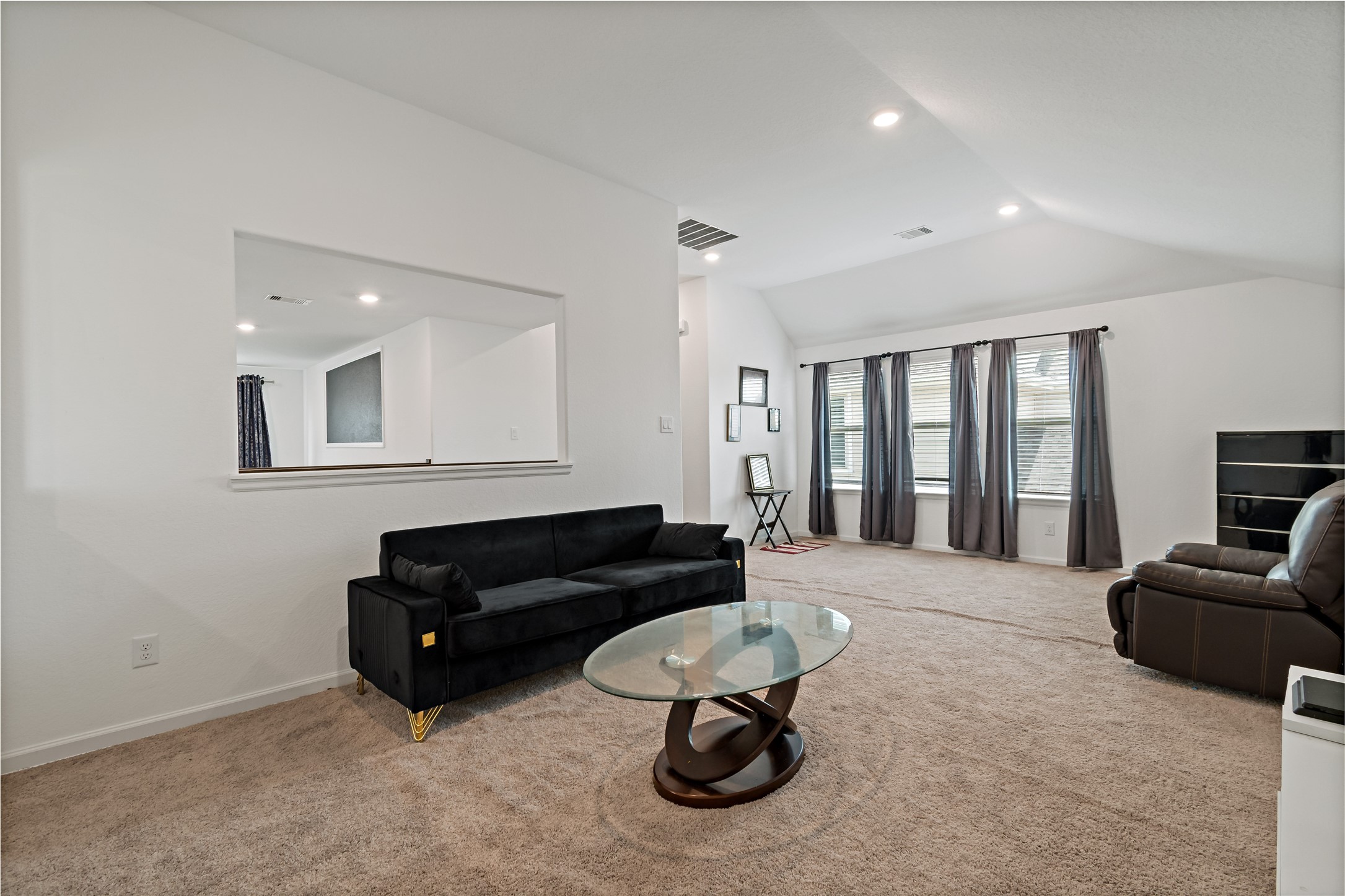 14010 Hartford Heights Way Rosharon, TX 77583 - Photo 24 of 30 a living room with furniture and a flat screen tv