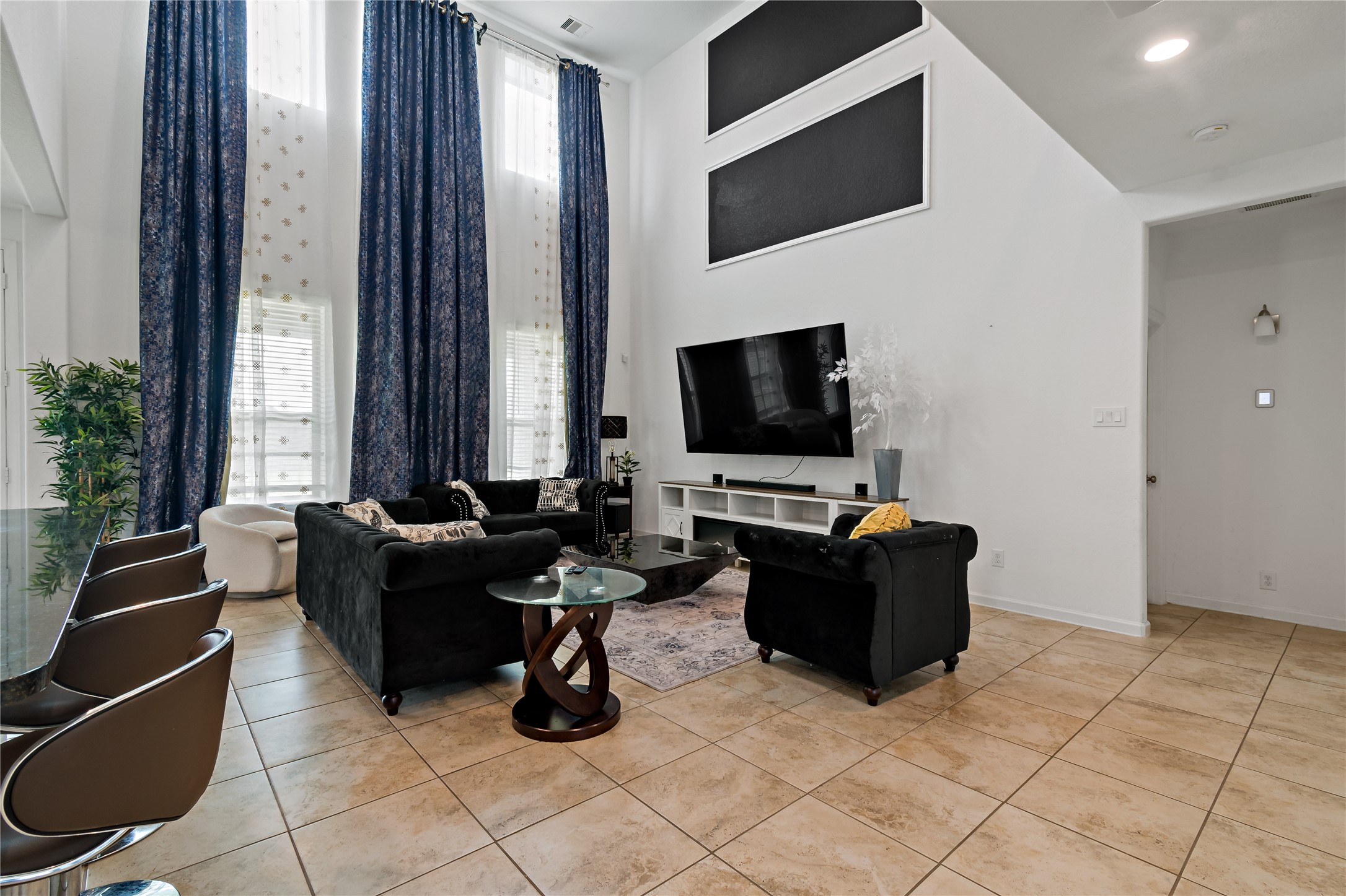 14010 Hartford Heights Way Rosharon, TX 77583 - Photo 9 of 30 a living room with furniture and a flat screen tv
