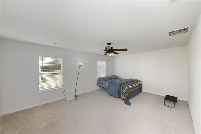 a bathroom with a double vanity sink mirror and double