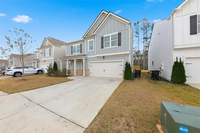 a view of a car park in front of a building