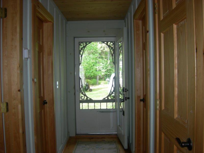 134 Rays Point Road Milbridge, ME 04658 - Photo 16 of 23 Front entry with two bedrooms and a...
