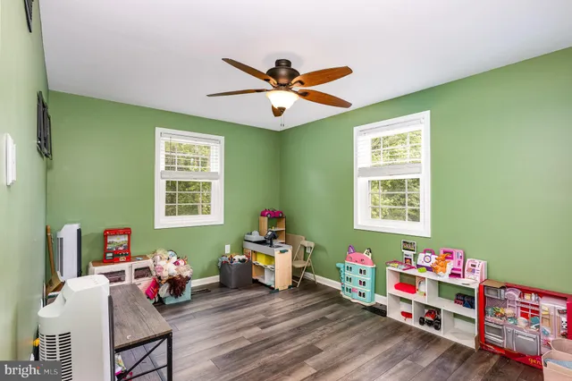 a room with toys and wooden floor