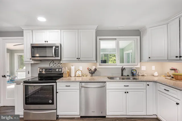 a workspace with furniture and wooden floor