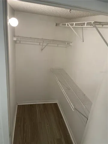 a view of a room with racks on the wall