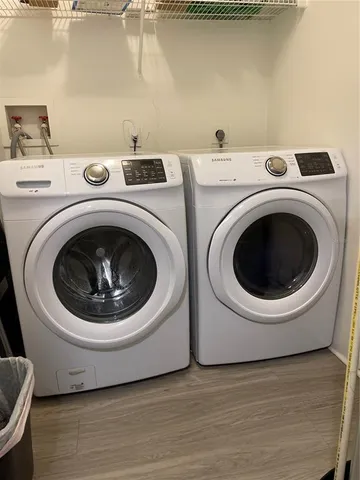 a utility room with dryer and washer