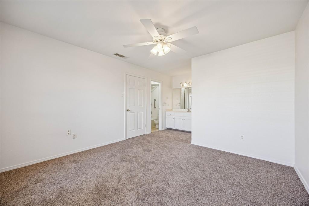 6504 Chicory Court, Unit R Dallas, TX 75214 - Photo 12 of 23 Primary Bedroom