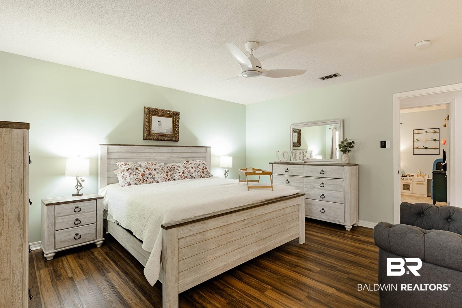 2920 Quail Creek Run Mobile, AL 36695 - Photo 19 of 33 Bedroom with dark wood finished floors and ceiling fan