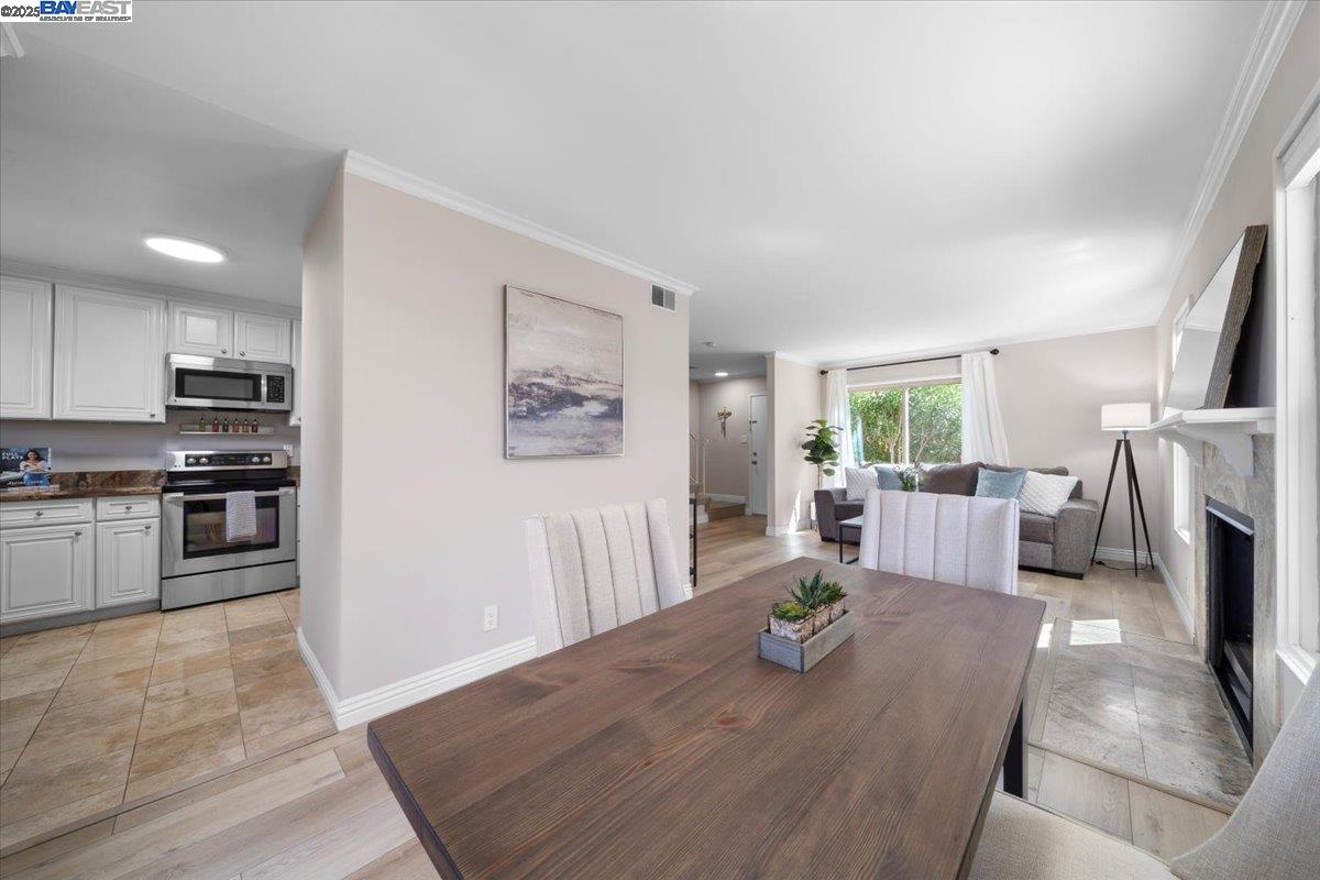 427 Chalda Way Moraga, CA 94556 - Photo 29 of 31 Enjoy sit-down meals in the elegant dining room, featuring open floorplan for seamless entertaining.