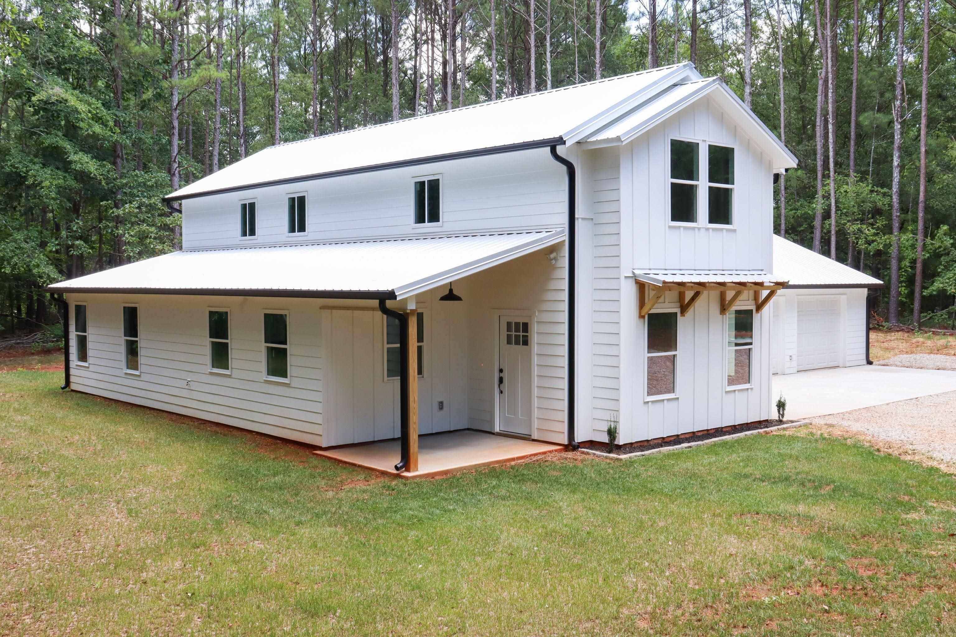 4425 Bold Springs Road Monroe, GA 30656 - Photo 1 of 1 a front view of a house with a yard