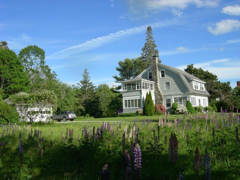 122 Point Road Hancock, ME 04640 - Photo 1 of 13 Side view of house, glassed in...