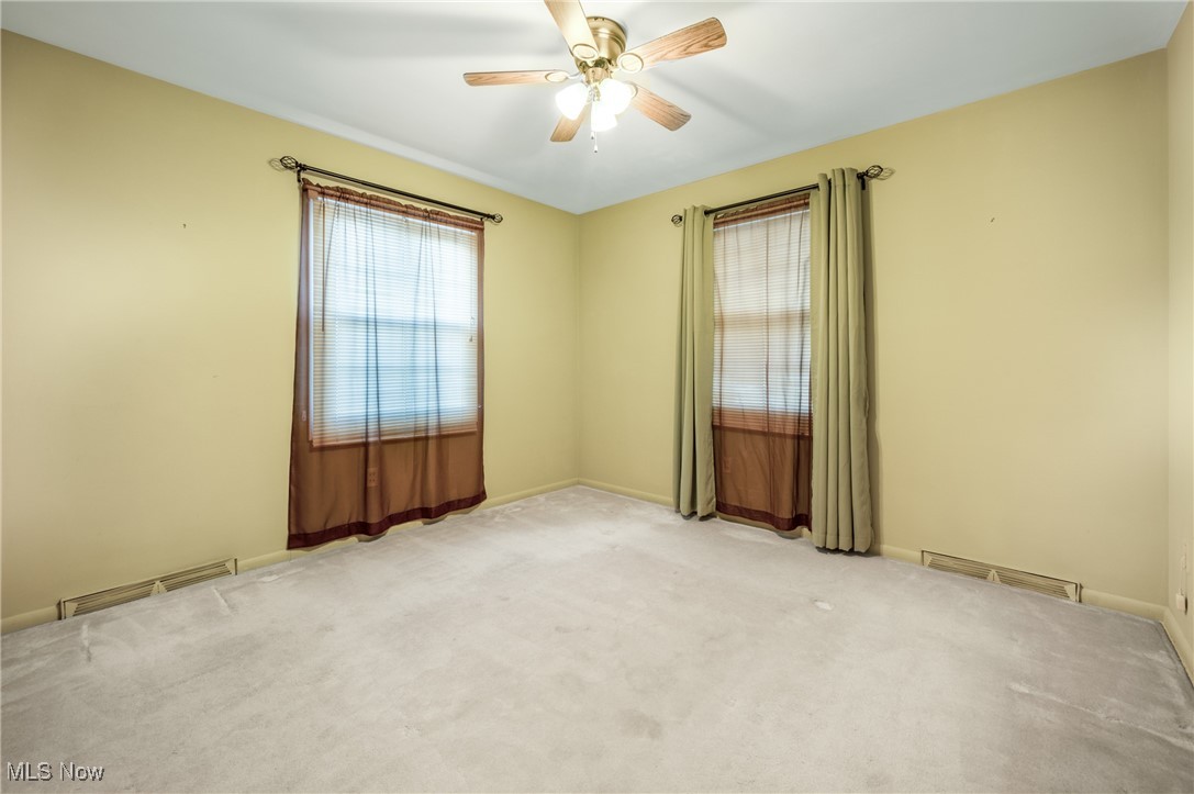 844 Roseland Road Alliance, OH 44601 - Photo 25 of 40 with ceiling fan and carpet