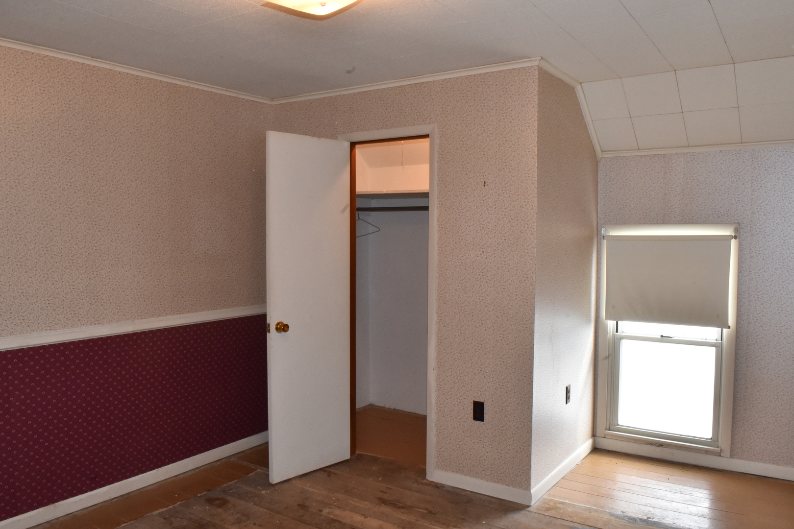 13801 Lister Road Morrison, IL 61270 - Photo 15 of 30 an empty room with wooden floor closet and windows