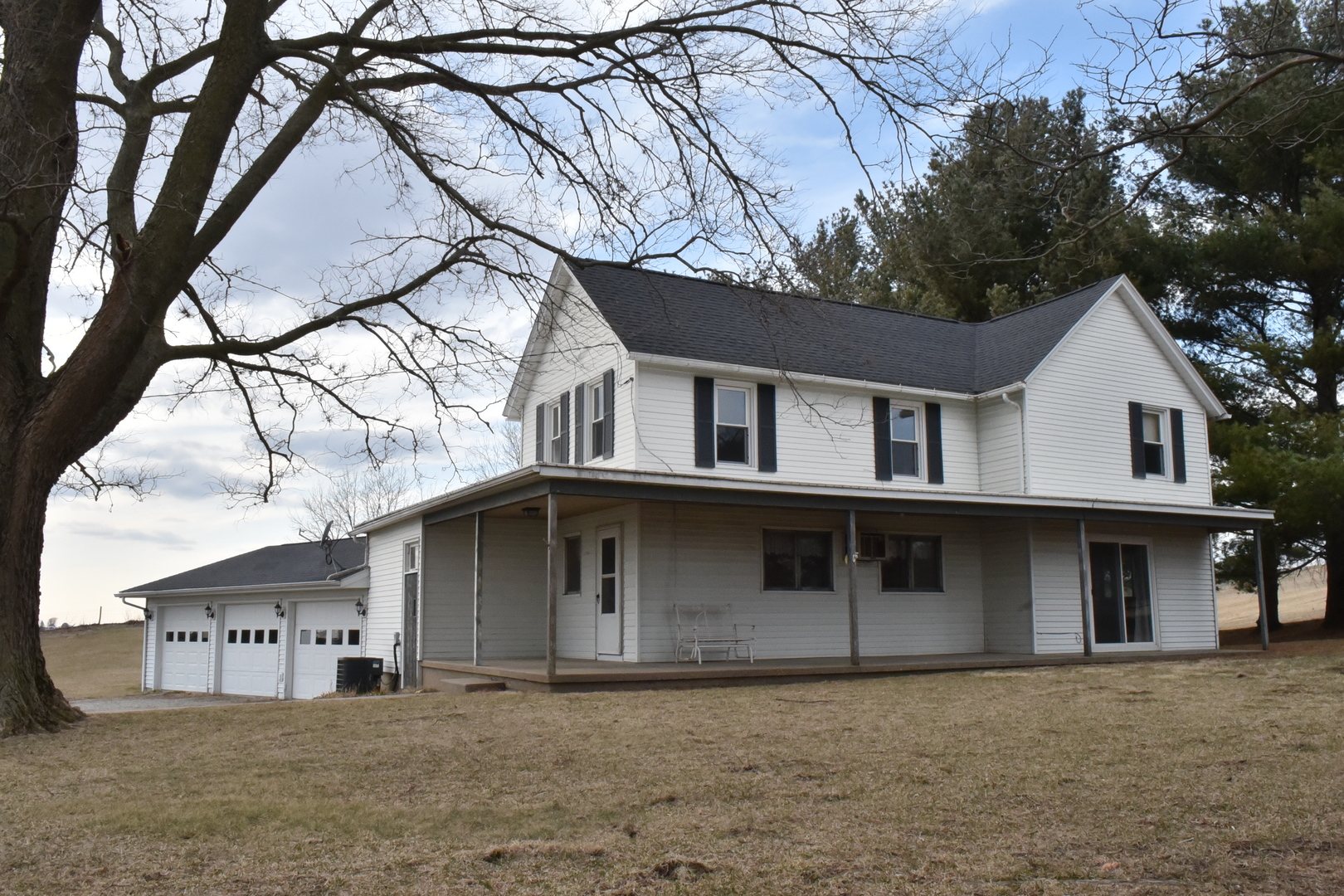 13801 Lister Road Morrison, IL 61270 - Photo 2 of 30 a house that has a tree in front of it