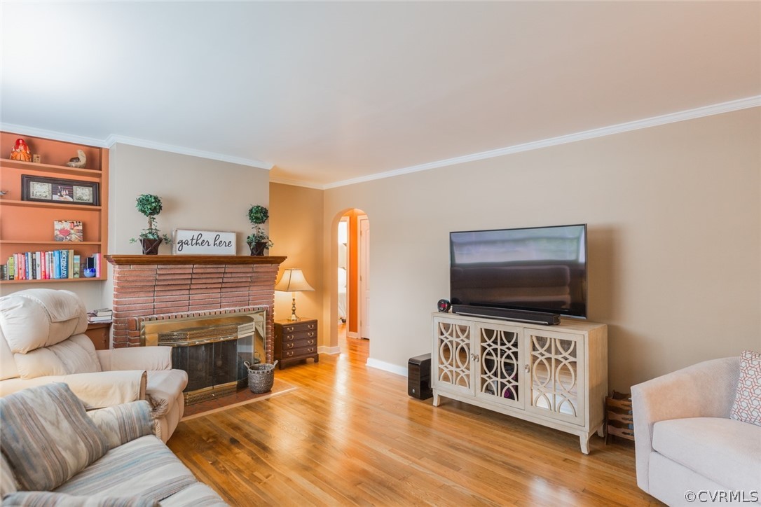 7404 Biscayne Road Henrico, VA 23294 - Photo 5 of 22 Beautiful living room with hardwood floor, firepla