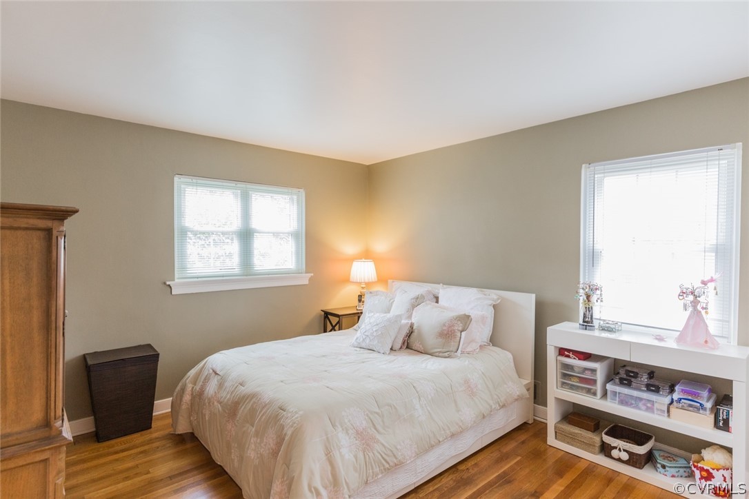 7404 Biscayne Road Henrico, VA 23294 - Photo 10 of 22 The master bedroom features a beautiful hardwood f