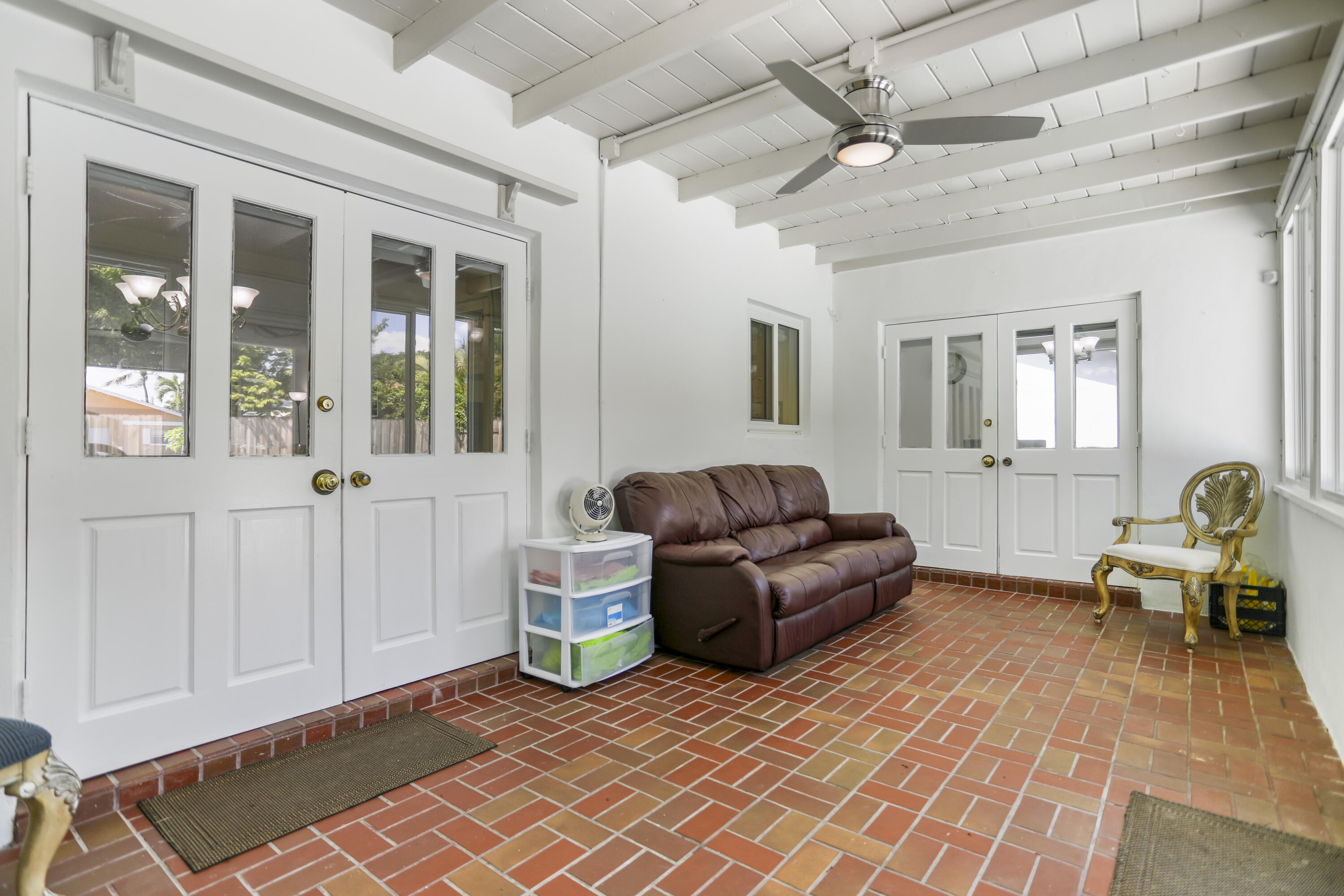 22682 Southwest 65th Avenue Boca Raton, FL 33428 - Photo 35 of 58 a living room with furniture and a window