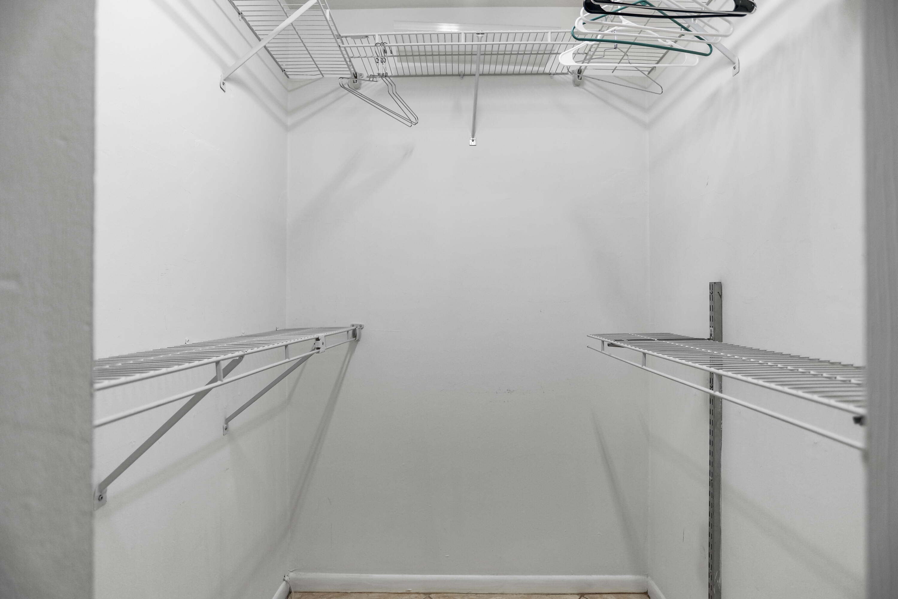 22682 Southwest 65th Avenue Boca Raton, FL 33428 - Photo 41 of 58 a view of a room with racks on the wall