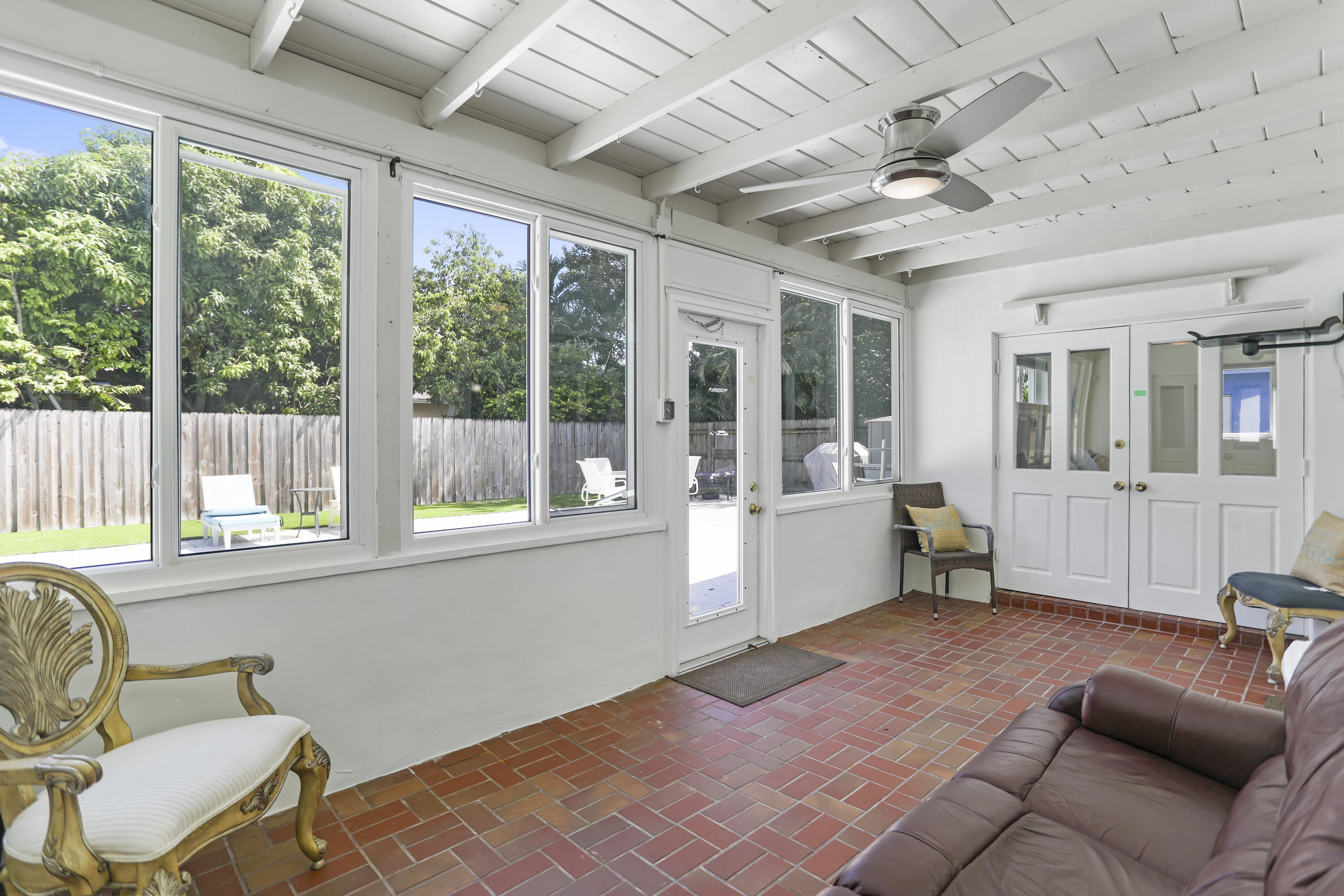 22682 Southwest 65th Avenue Boca Raton, FL 33428 - Photo 46 of 58 a very nice looking room with a large window