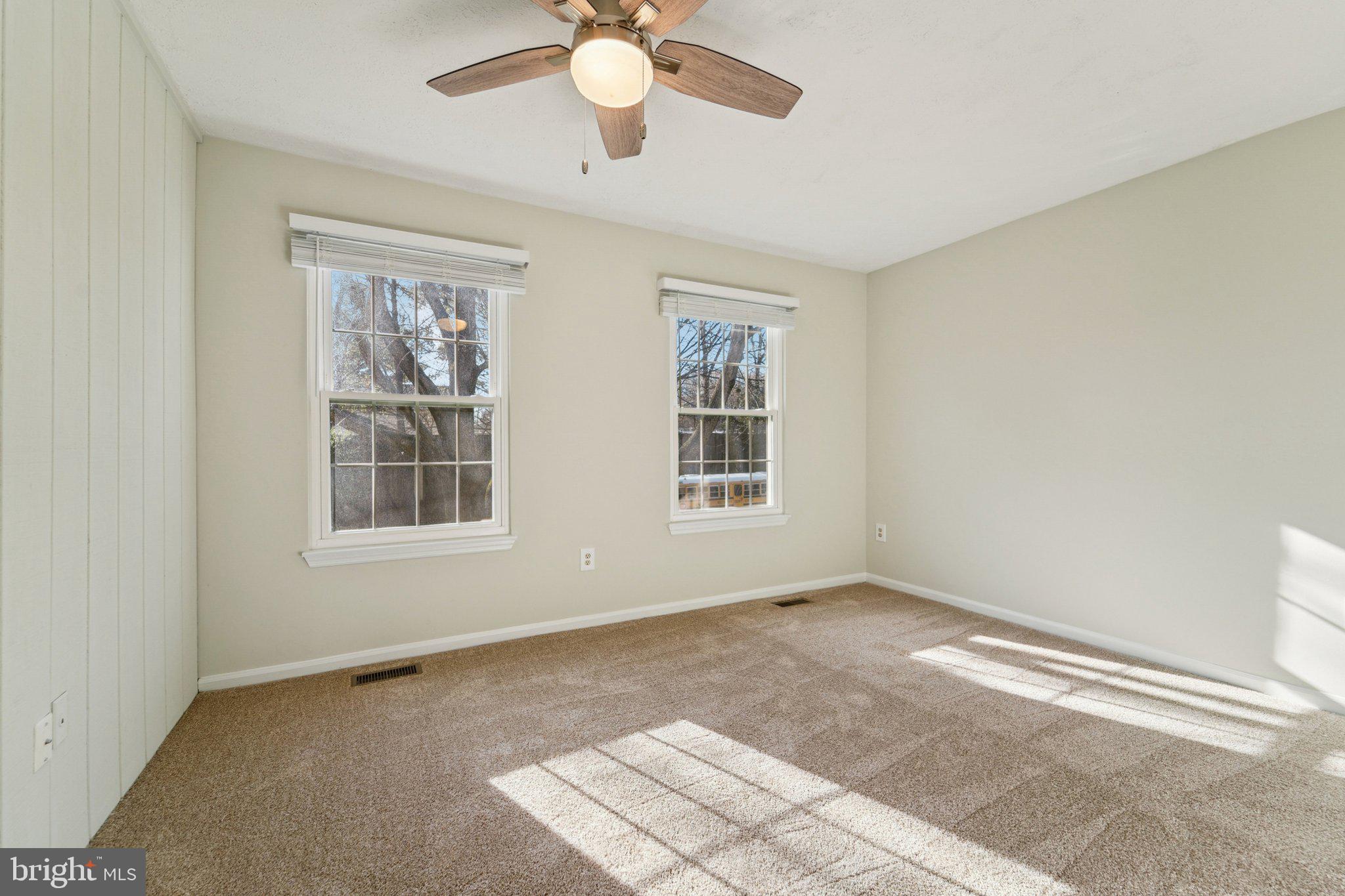 216 Bookham Lane Gaithersburg, MD 20877 - Photo 21 of 49 an empty room with windows and fan