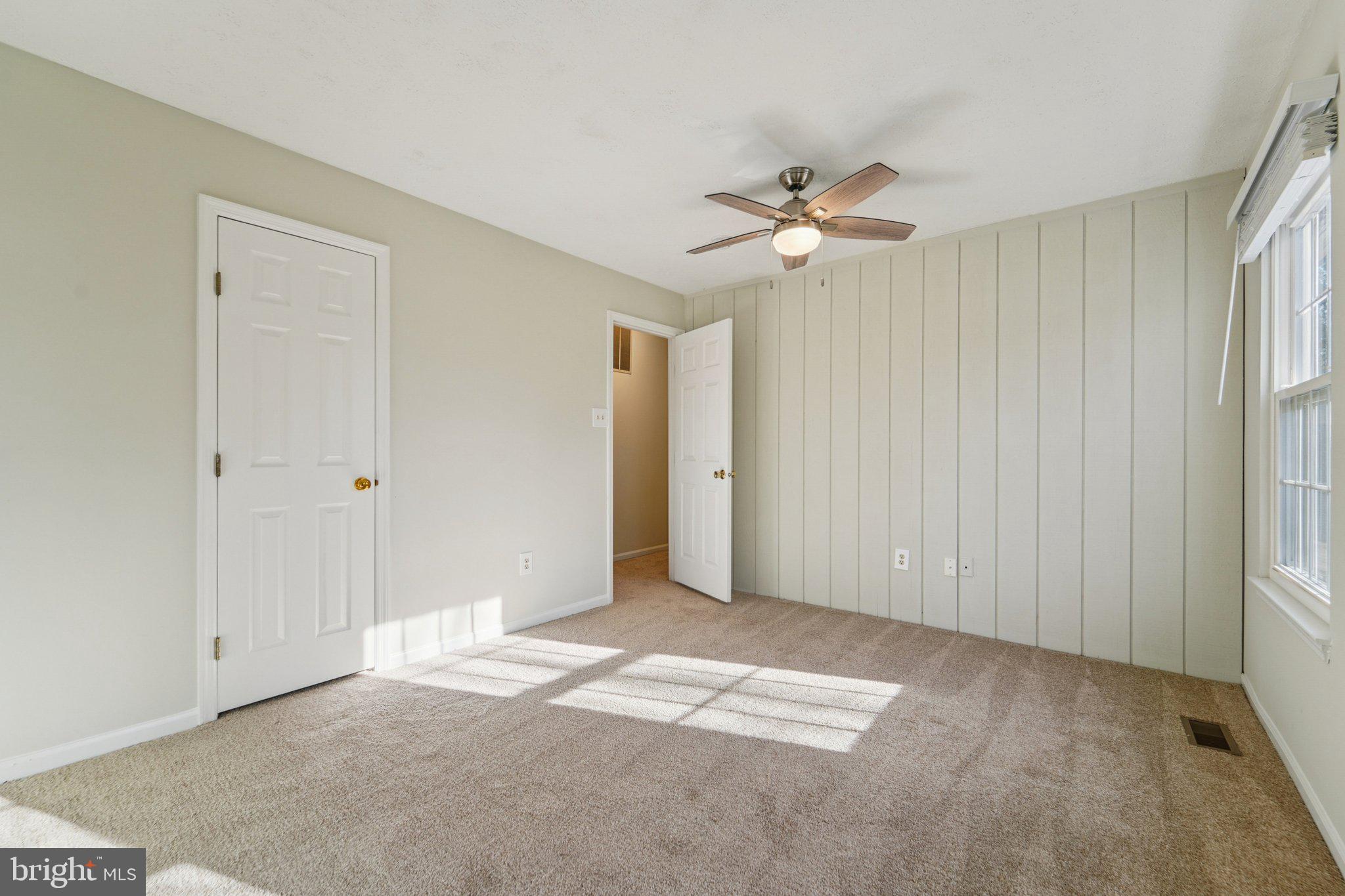 216 Bookham Lane Gaithersburg, MD 20877 - Photo 22 of 49 a view of an empty room with a window