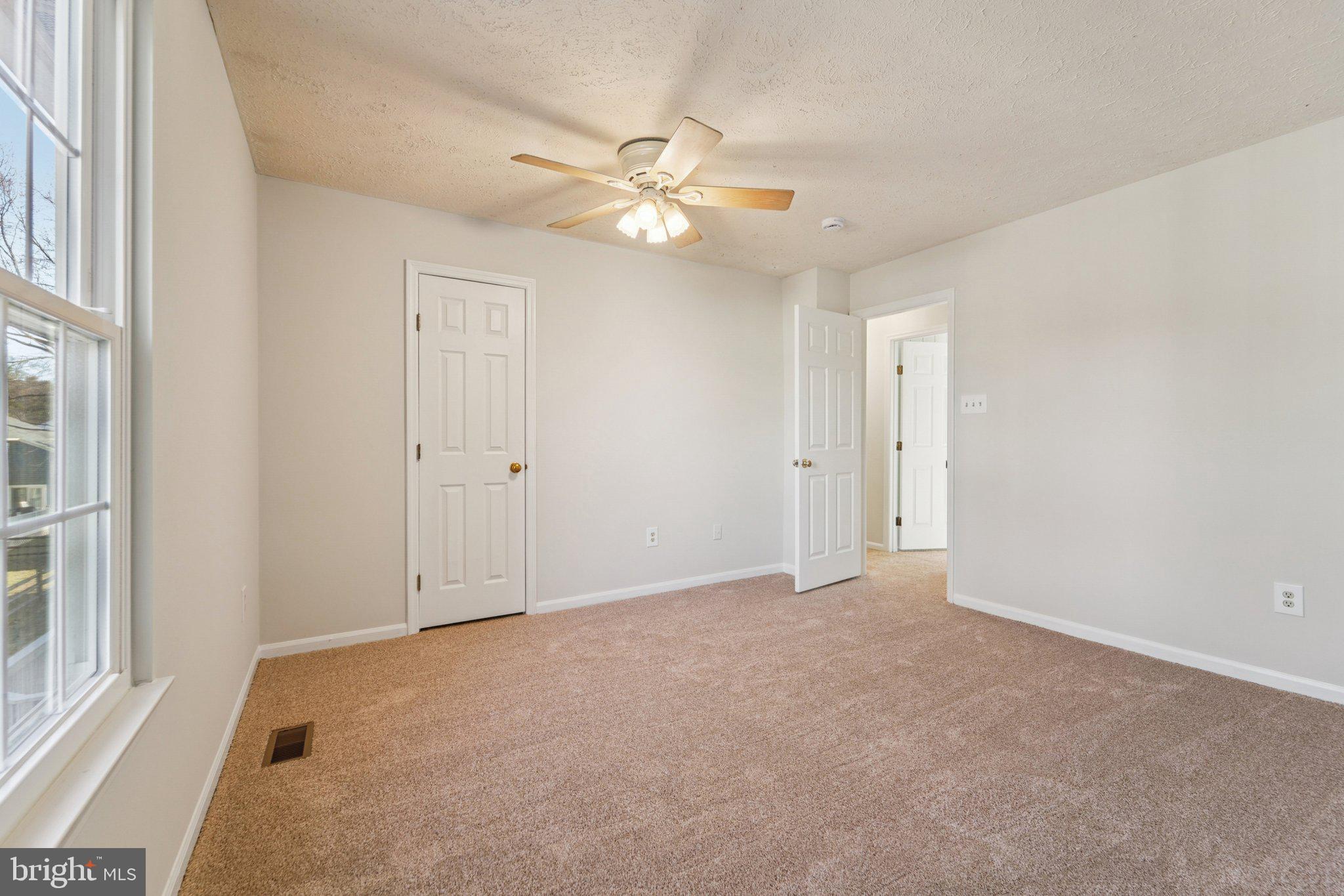 216 Bookham Lane Gaithersburg, MD 20877 - Photo 24 of 49 a view of an empty room with a window