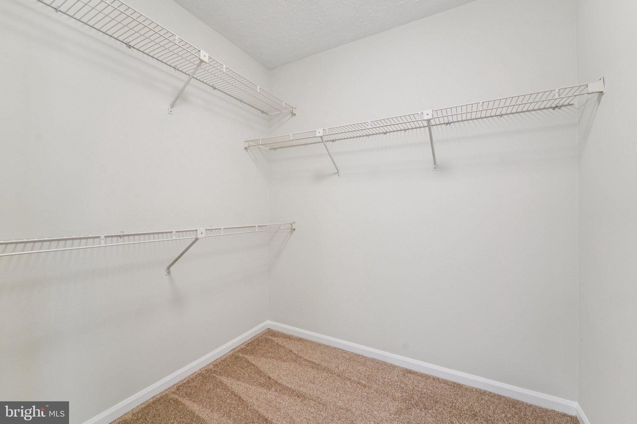 216 Bookham Lane Gaithersburg, MD 20877 - Photo 28 of 49 a view of a room with racks on the wall