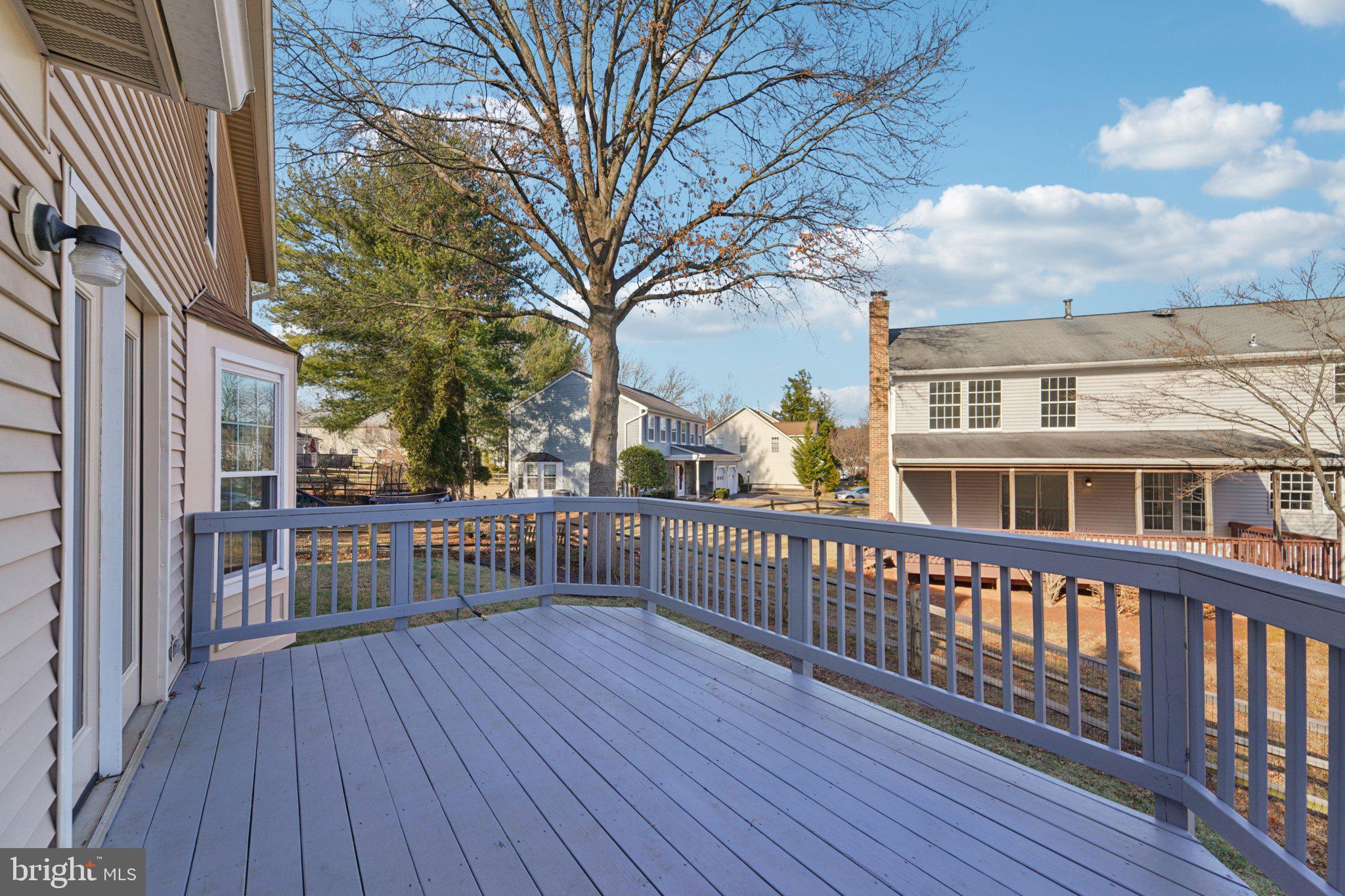 216 Bookham Lane Gaithersburg, MD 20877 - Photo 3 of 49 a view of a house with wooden deck