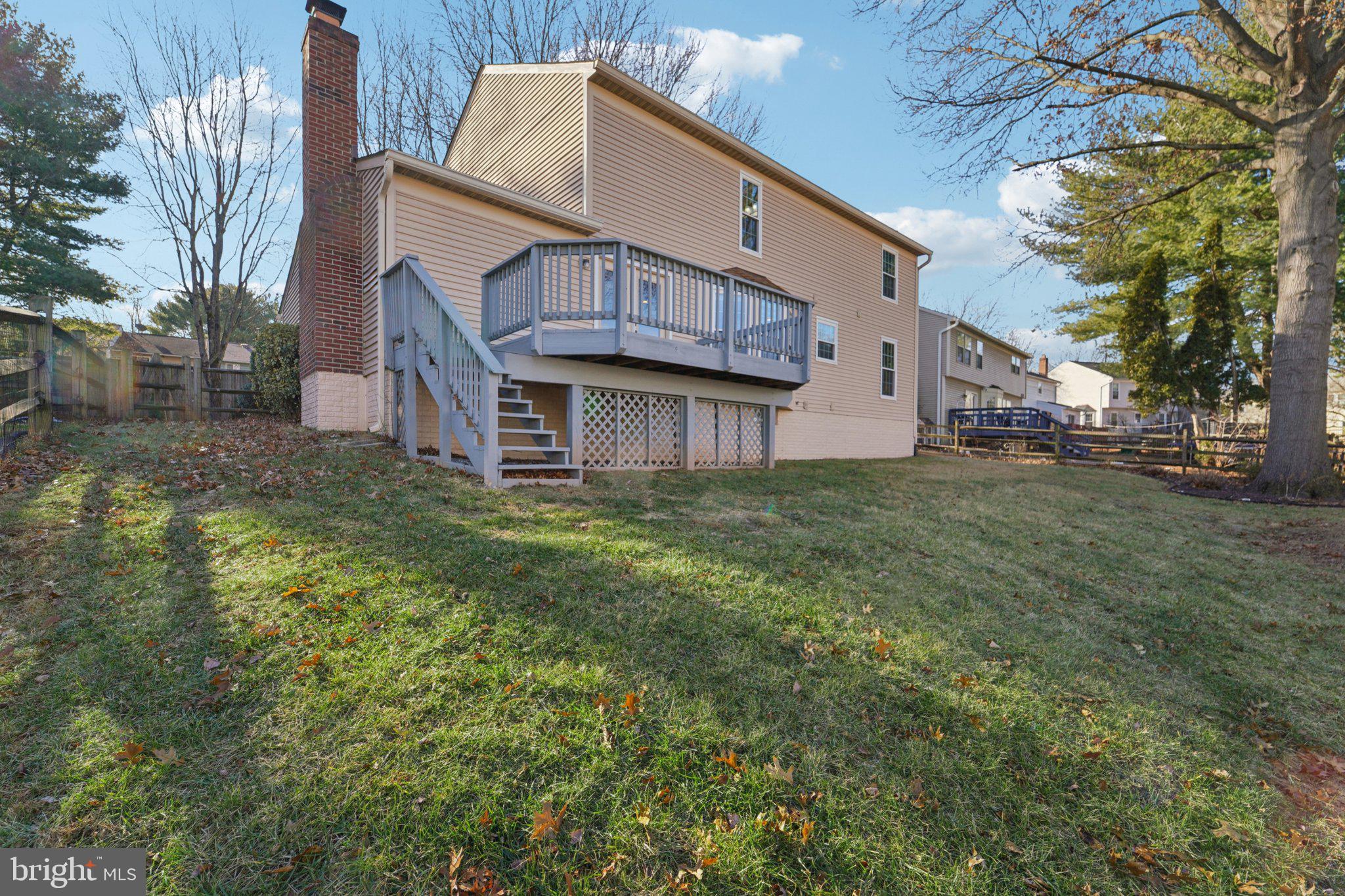 216 Bookham Lane Gaithersburg, MD 20877 - Photo 37 of 49 a view of a house with a yard