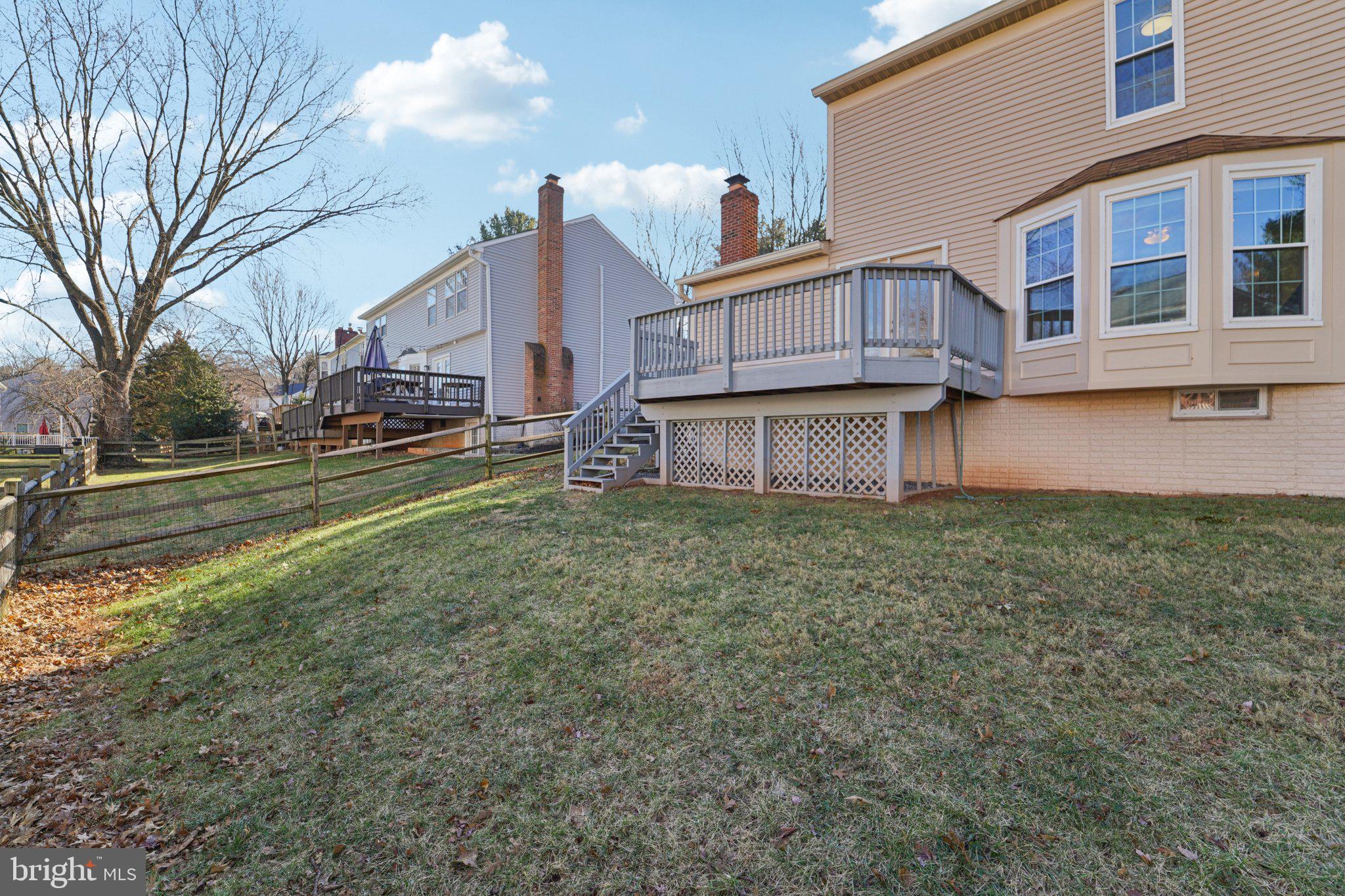 216 Bookham Lane Gaithersburg, MD 20877 - Photo 46 of 49 a view of a house with a back yard
