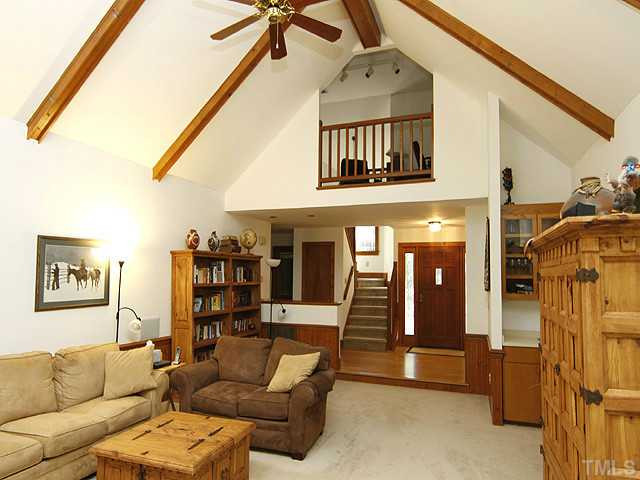 Living Room View toward Front Door. Note Loft.