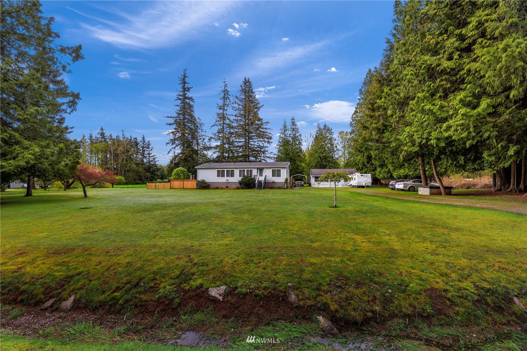 1761 Kaas Road Ferndale, WA 98248 - Photo 1 of 22 a view of yard with green space and trees