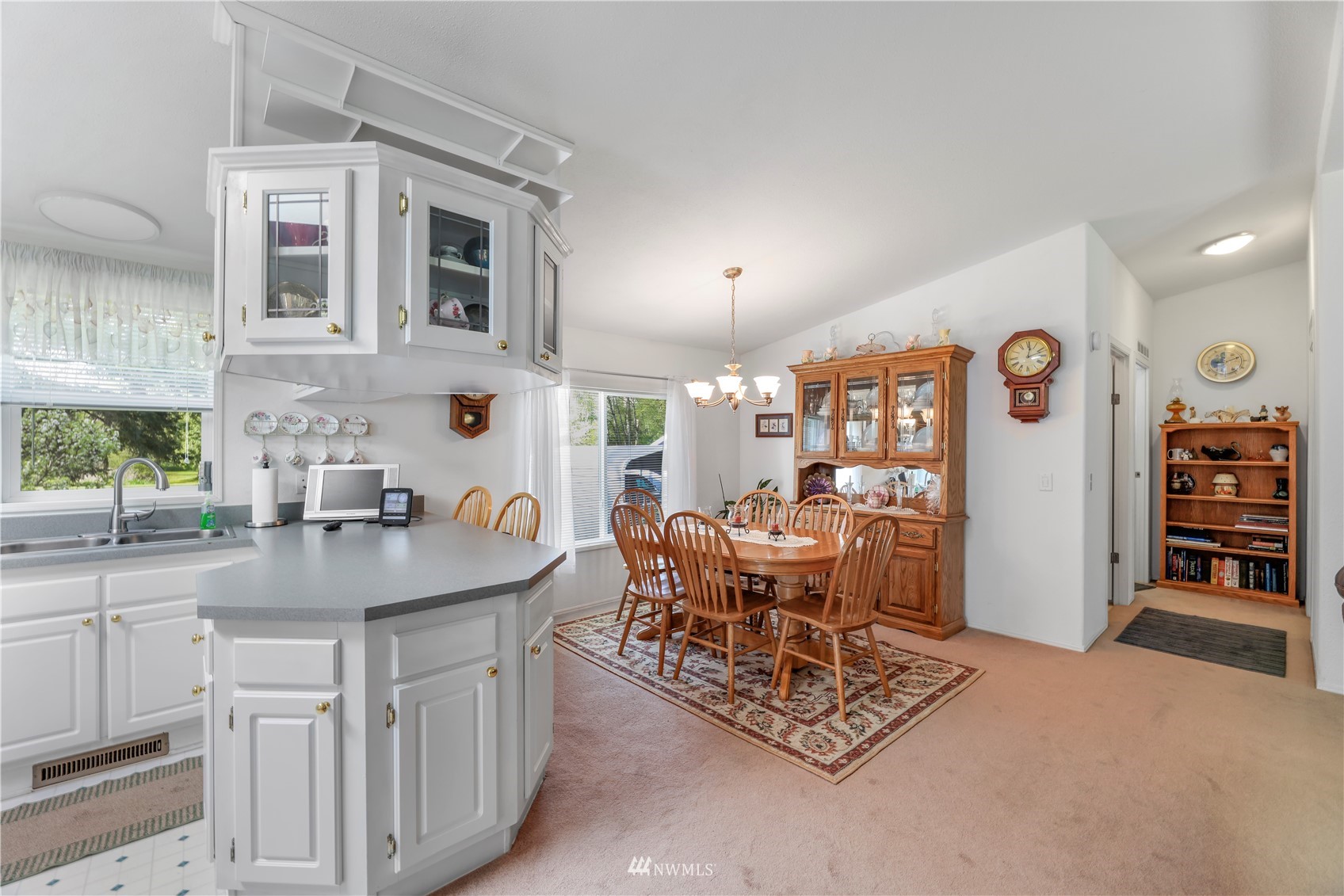 1761 Kaas Road Ferndale, WA 98248 - Photo 13 of 22 a kitchen with stainless steel appliances granite countertop a sink and a refrigerator