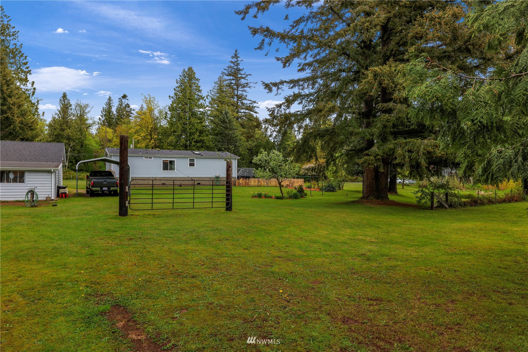 1761 Kaas Road Ferndale, WA 98248 - Photo 2 of 22 a view of a house with a yard