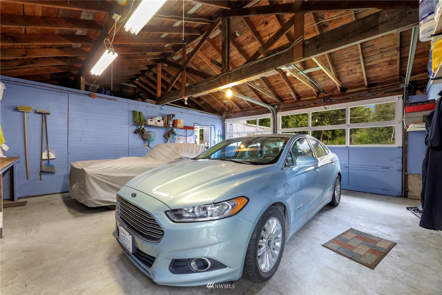 1761 Kaas Road Ferndale, WA 98248 - Photo 7 of 22 a car parked in a garage