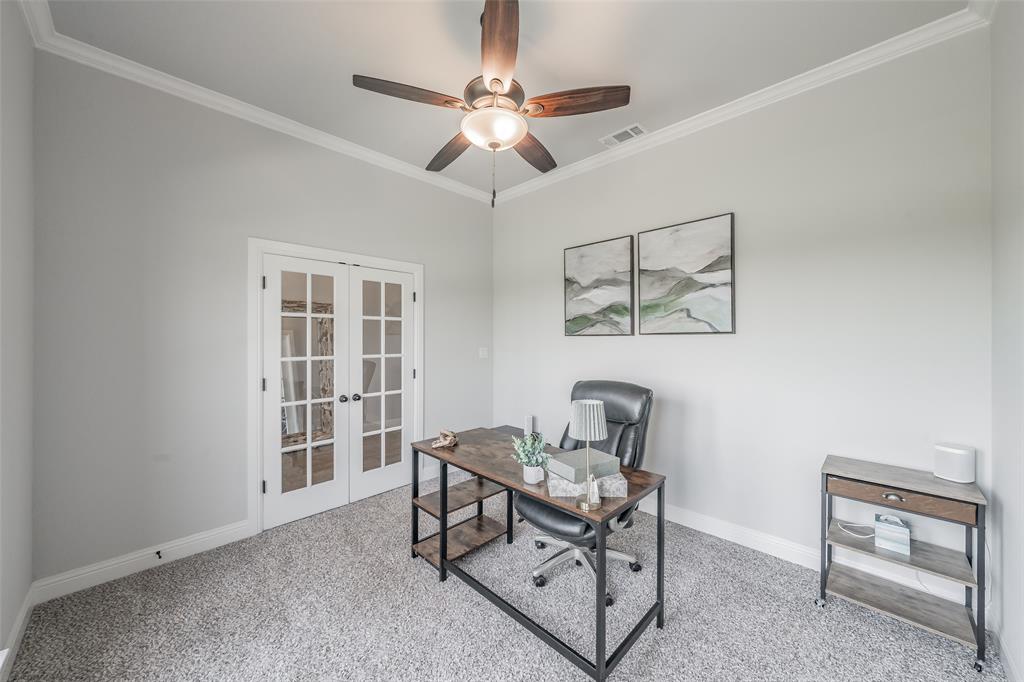 2230 County Road 2360 Decatur, TX 76234 - Photo 5 of 40 Spacious living room equipped with a fireplace & hardwood style tile