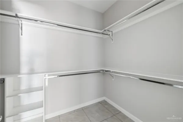 a view of an empty walk in closet