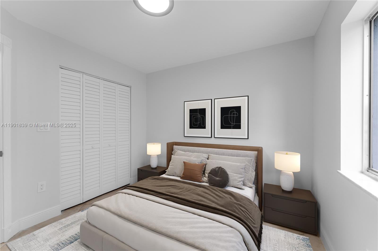 14512 Southwest 138th Court Miami, FL 33186 - Photo 19 of 28 a bedroom with a bed and a couch