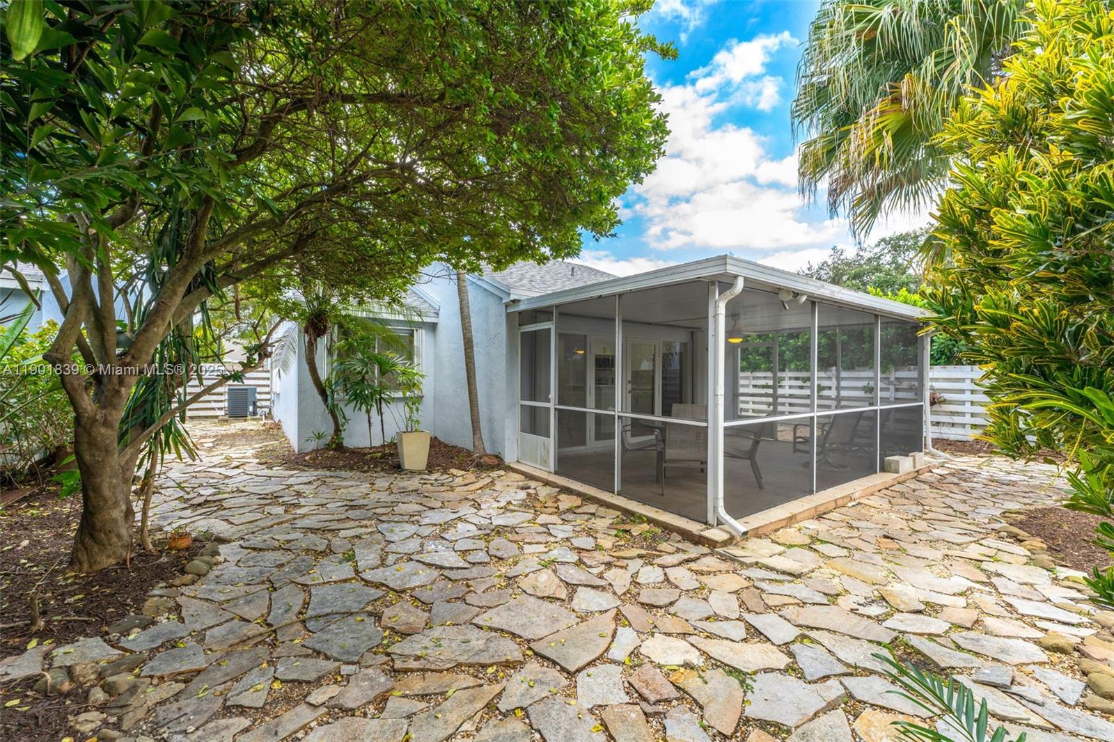 14512 Southwest 138th Court Miami, FL 33186 - Photo 24 of 28 a view of a house with a window