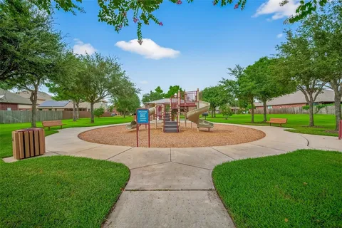 a view of a park with slide